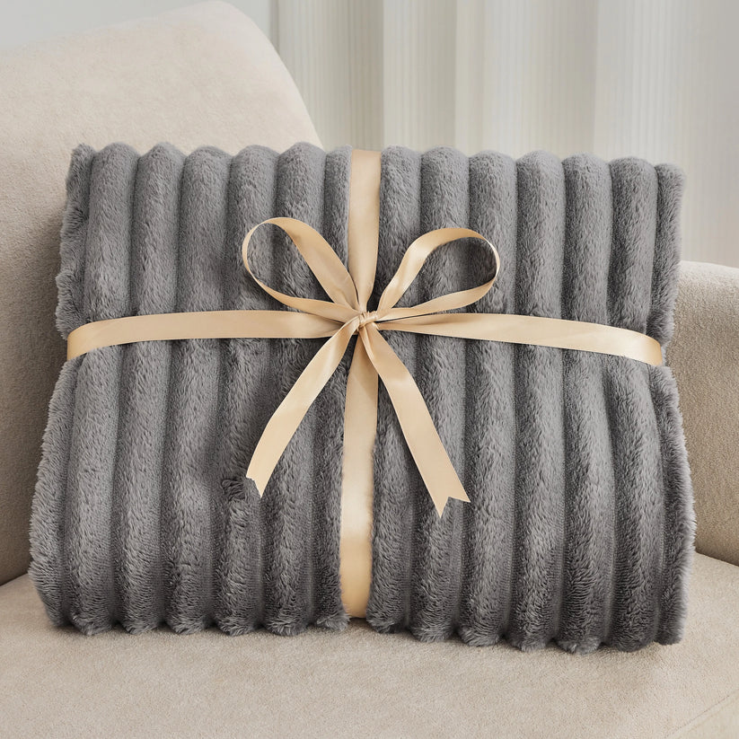 UniqlyFleece™ – Filten som kramar dig tillbaka